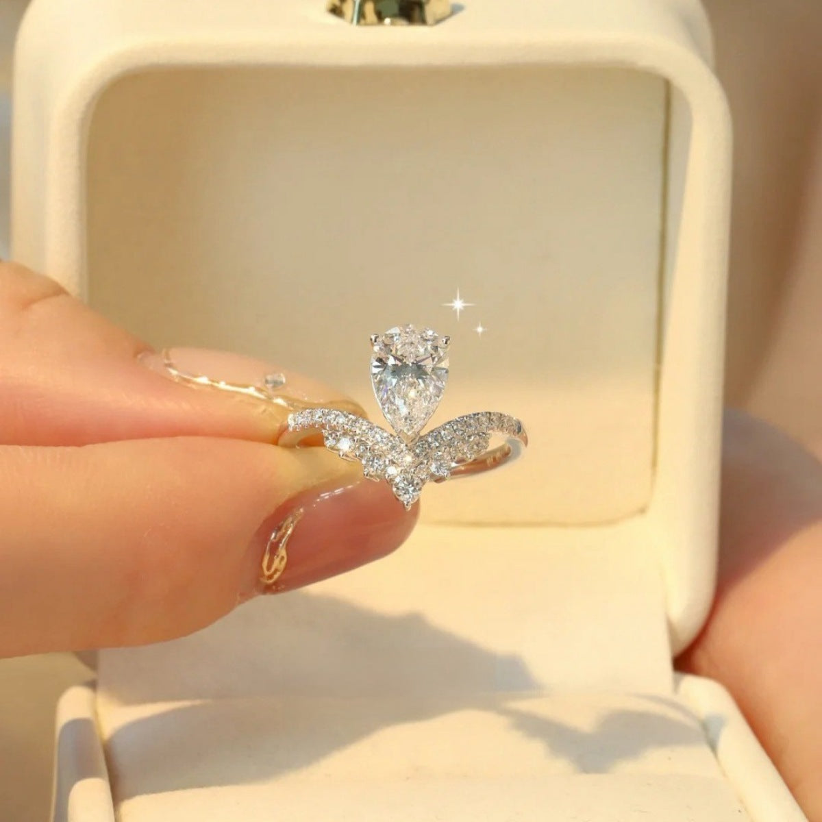 Sterling silver ring with a 1.5 carat moissanite gemstone, showcasing a sparkling, elegant jewelry piece.