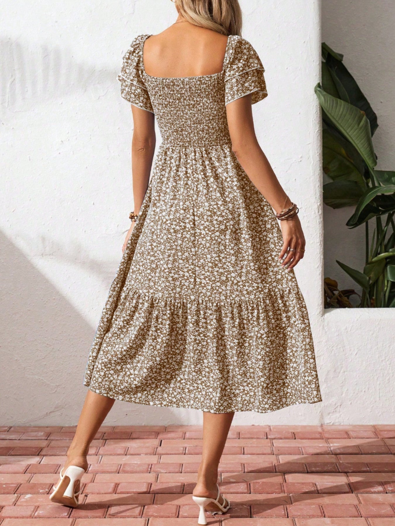 Floral print smocked ruffle sleeve midi dress by Trendsi, lightweight summer dress with feminine floral pattern and ruffle details.