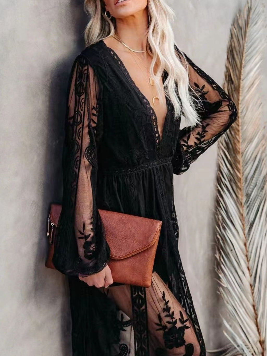 Floral lace high-slit maxi dress from Trendsi featuring an elegant evening gown with intricate lace details and a flowing silhouette.