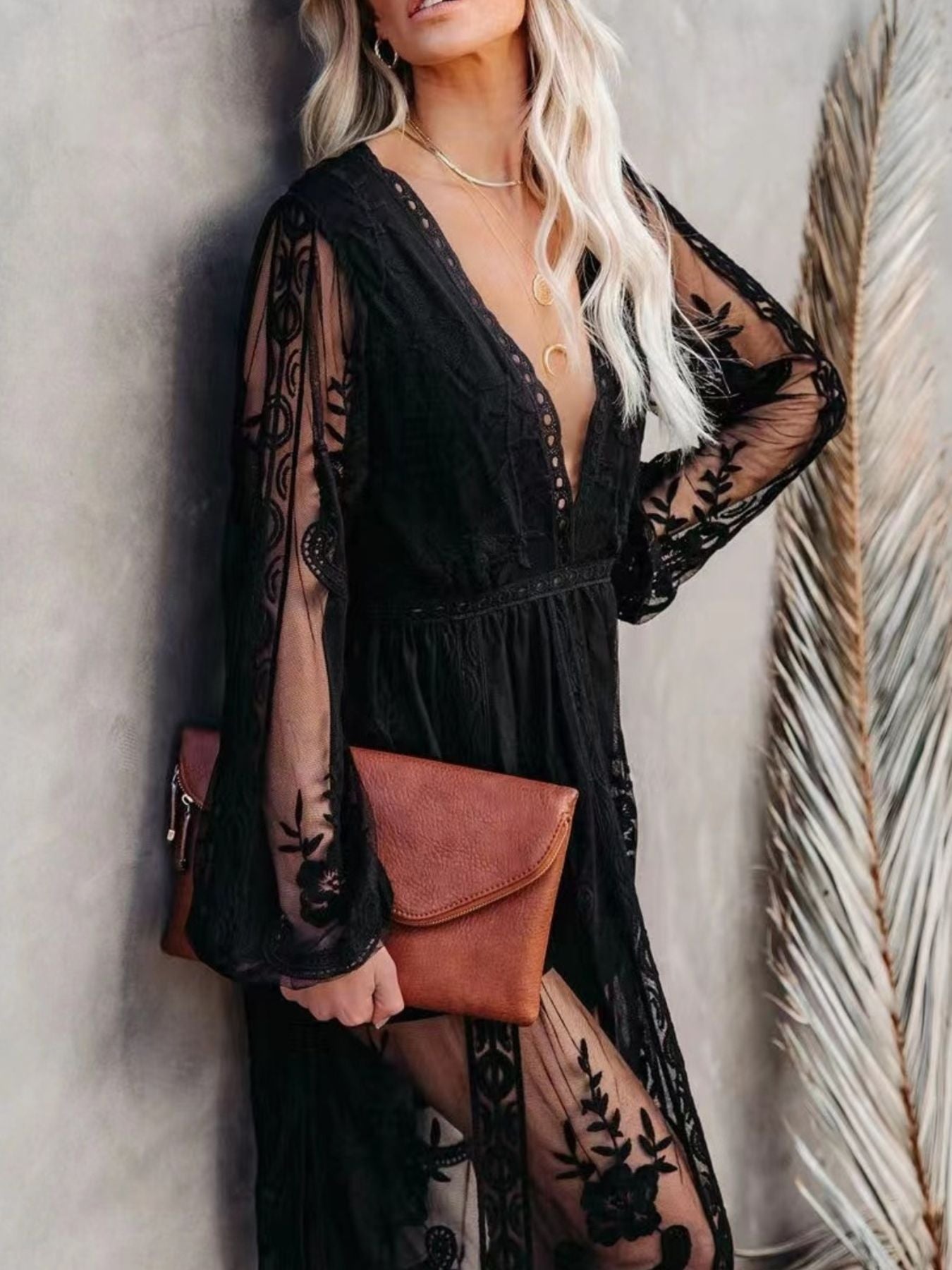 Floral lace high-slit maxi dress from Trendsi featuring an elegant evening gown with intricate lace details and a flowing silhouette.