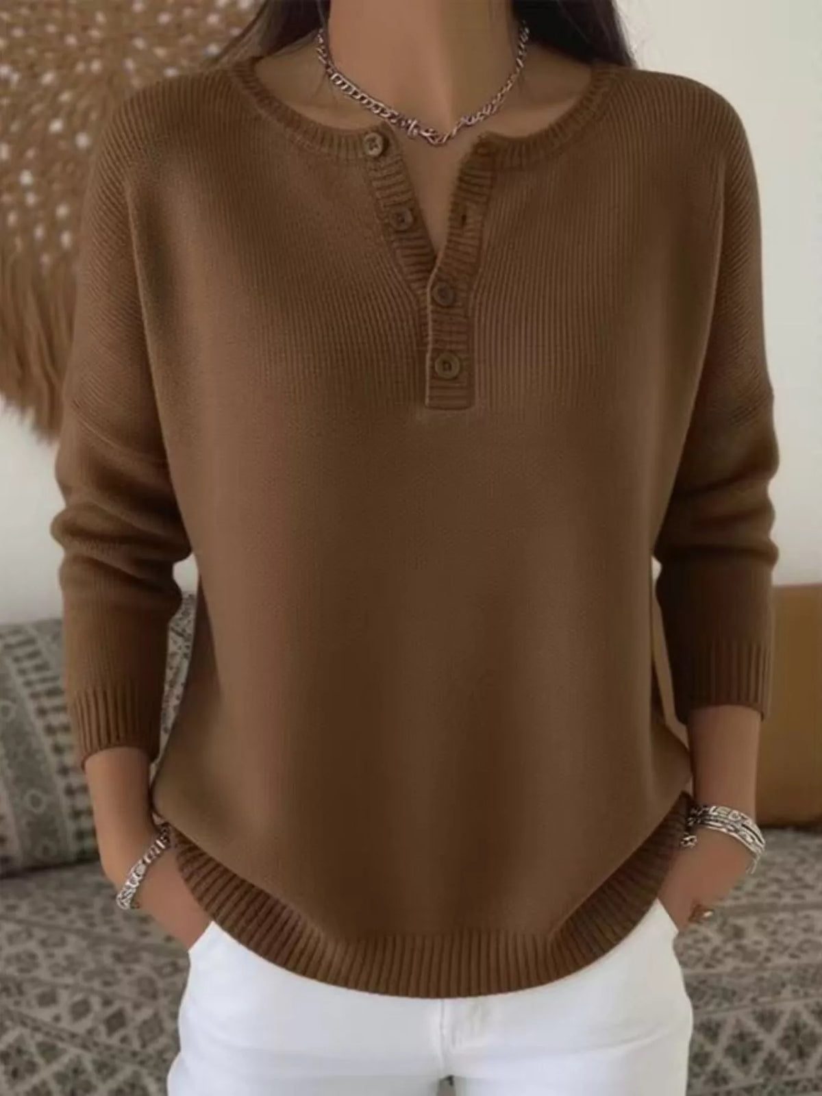 Plus size ribbed knit sweater with button details, featuring a cozy, full-length design ideal for stylish winter wear.