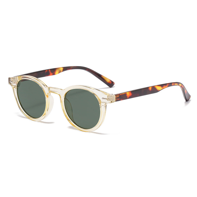 Retro round UV400 sunglasses with tinted frames, European style eye wear from Plush Fashion Hub, showing the stylish design.