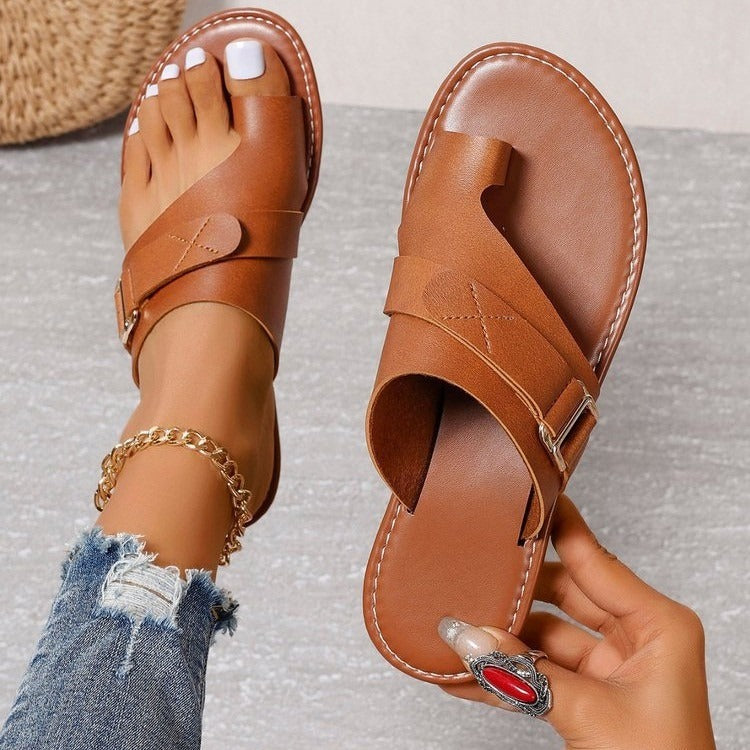 Elegant Plush Fashion Hub closed-toe flat sandals with sleek design and comfortable fit, perfect for casual or dressy occasions.
