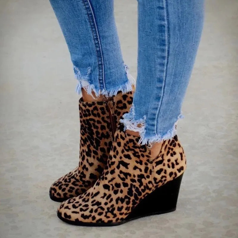 Trendsi high heel ankle boots with side zipper, featuring sleek design and stiletto heel, made of smooth black leather.