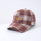 Women's striped checkered embroidered baseball cap by Plush Fashion Hub, featuring a stylish design in four color options.
