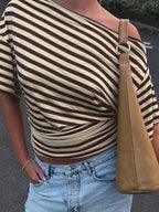 Women's striped one-shoulder T-shirt by Trendsi featuring a chic, asymmetrical design and comfortable fit.