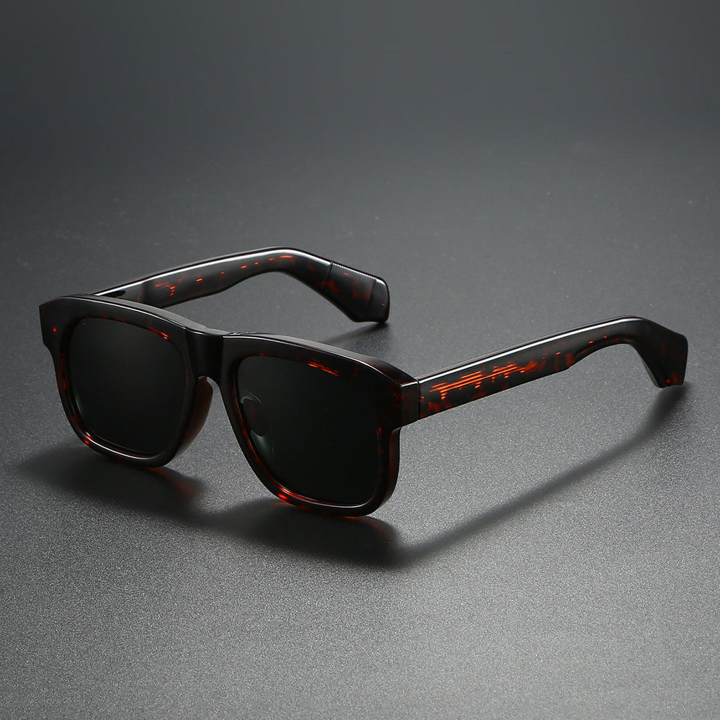Unisex acetate-style polarized fashion sunglasses with luxury look, featuring sleek design and tinted lenses.