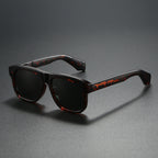 Unisex acetate-style polarized fashion sunglasses with luxury look, featuring sleek design and tinted lenses.