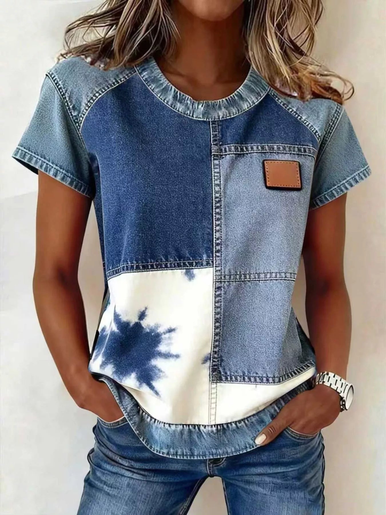 Denim patchwork short sleeve blouse by Plush Fashion Hub featuring mixed fabric patches and casual fit.