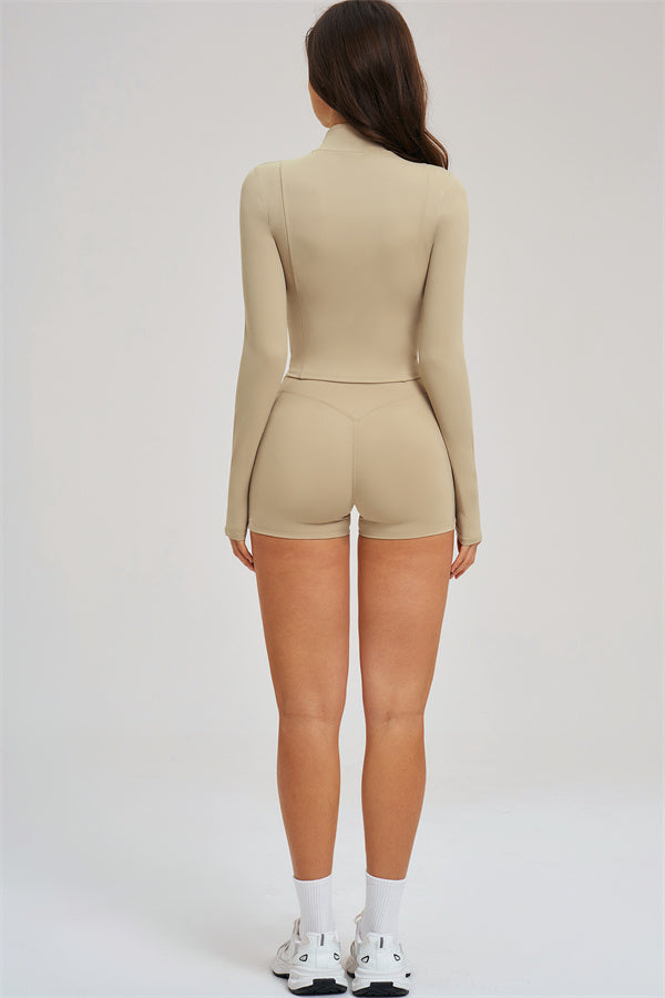 Fitglutes Activewear sports bra, zip jacket, and shorts 3-piece set for workout and gym activities.