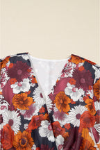 Flowy Marianna Mini Dress by Threaded Pear with floral pattern, featuring long sleeves and a lightweight, breezy design.
