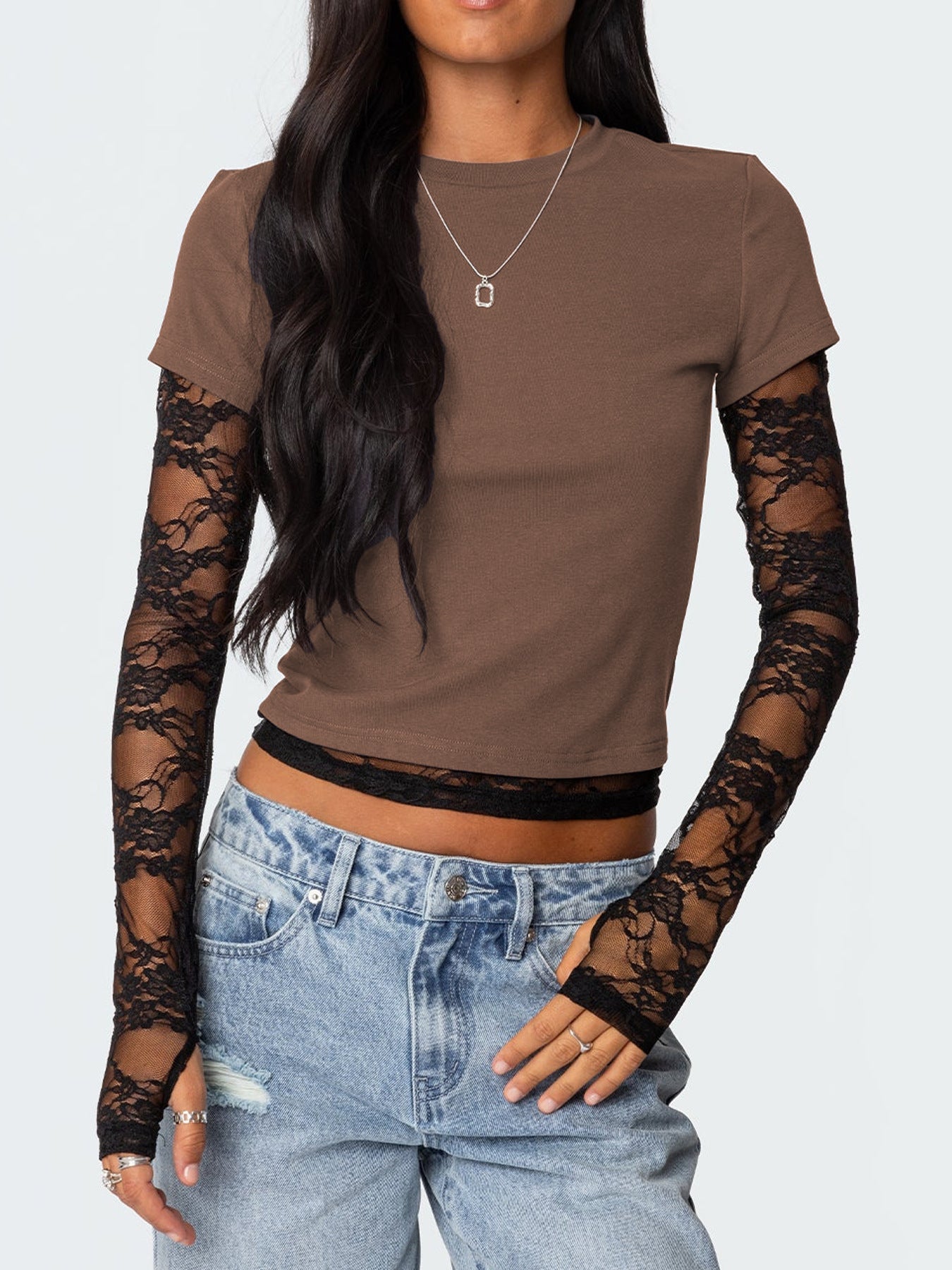 Women's fitted lace sleeve T-shirt by Trendsi featuring elegant lace details and a sophisticated casual style.