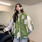Oversized Y2K lamb-wool bomber jacket for women by FitiqueFit, featuring a streetwear style with a plush, cozy appearance.