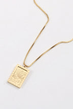 Stainless steel 18K gold-plated necklace with a sleek chain and minimalist pendant, stylish jewelry by Shopimist