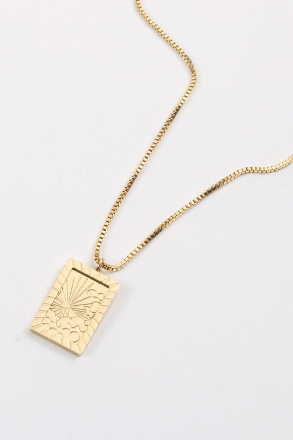 Stainless steel 18K gold-plated necklace with a sleek chain and minimalist pendant, stylish jewelry by Shopimist