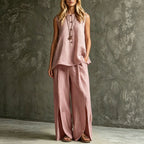 Women’s loose sleeveless tank top and slit wide-leg pants two-piece casualwear set by Plush Fashion Hub, shown on a model.