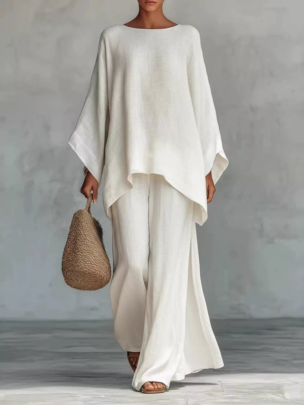 Plus size casual loose fit top and pants set by Trendsi, two-piece pants set with comfortable, relaxed style.