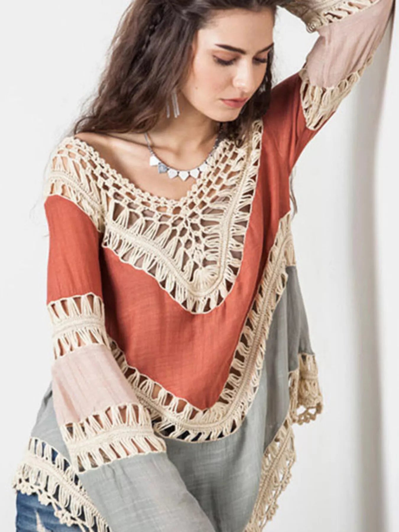 Crochet trimmed long sleeve swim cover-up from Trendsi featuring lightweight fabric and stylish design, perfect for beachwear.