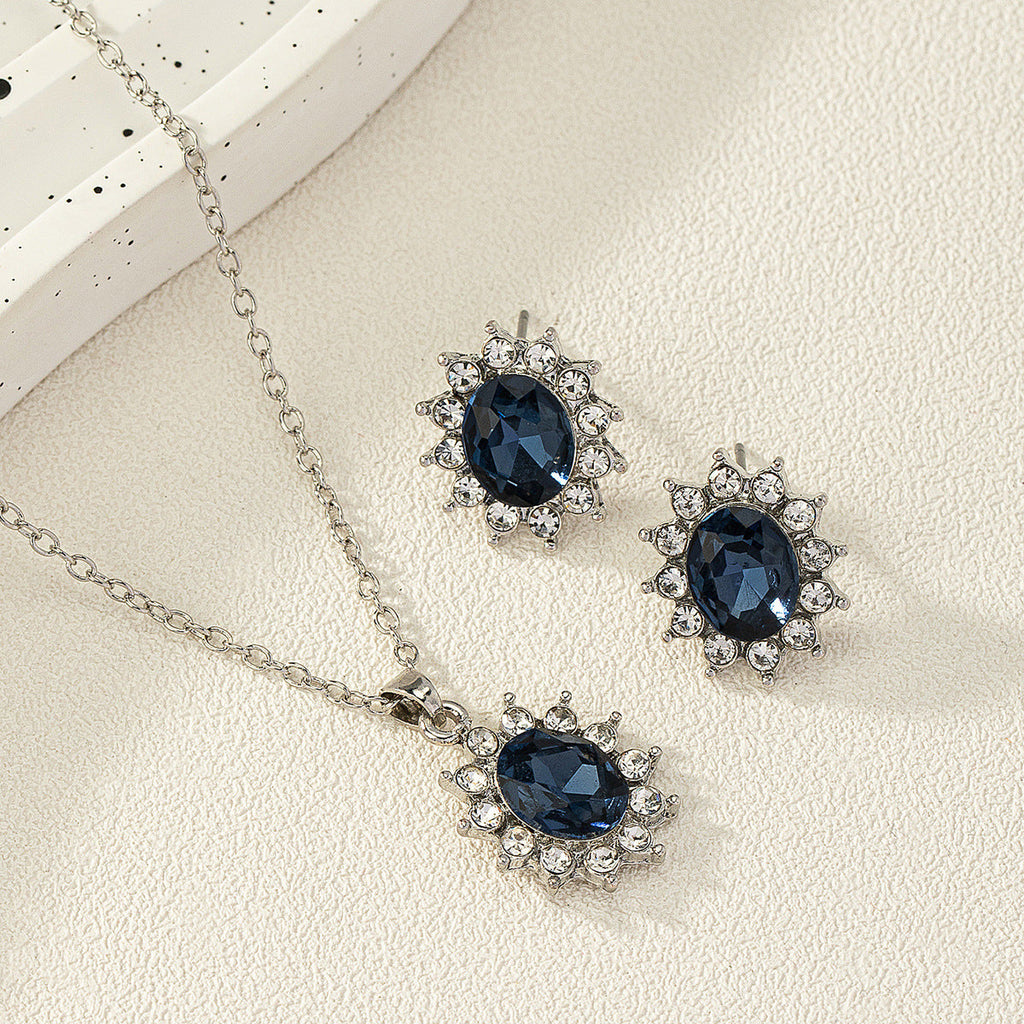 European and American fashion sunflower zircon ear stud necklace set featuring gold-tone jewelry with sunflower and zircon details.
