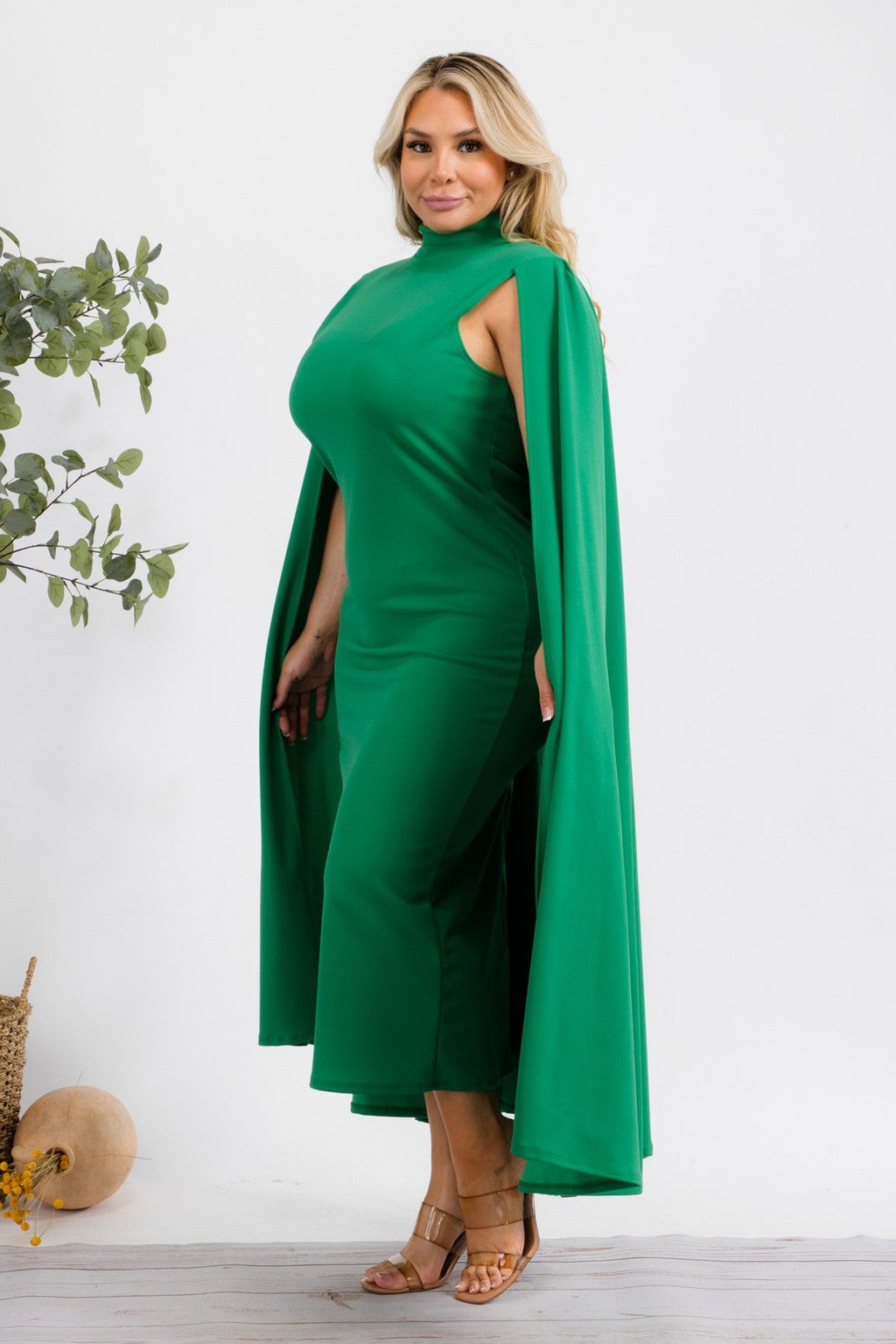 Green Stella Cape Plus Size Midi Dress by Fasheabe, featuring a flowing style with cape detail and midi length.