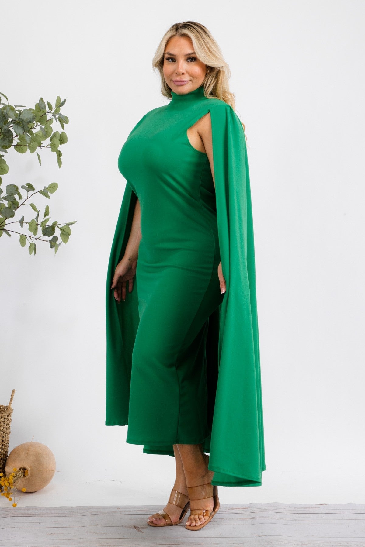 Green Stella Cape Plus Size Midi Dress by Fasheabe, featuring a flowing style with cape detail and midi length.