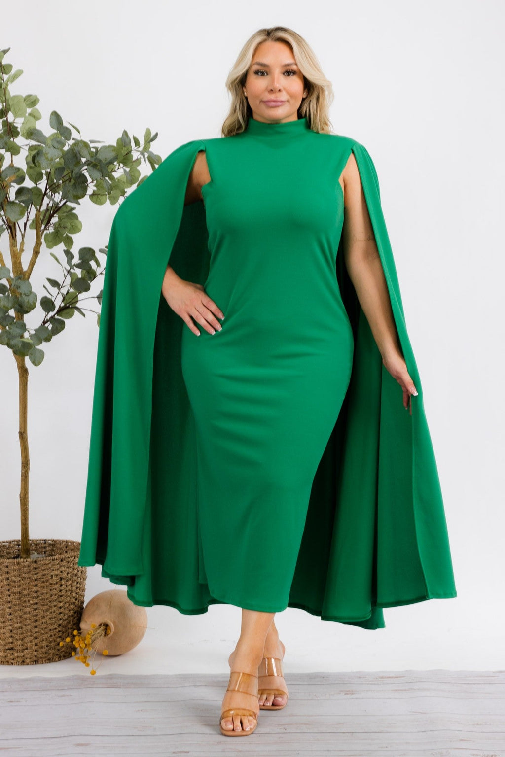 Green plus size midi dress from Fasheabe's Stella Cape collection, featuring a stylish and elegant design.