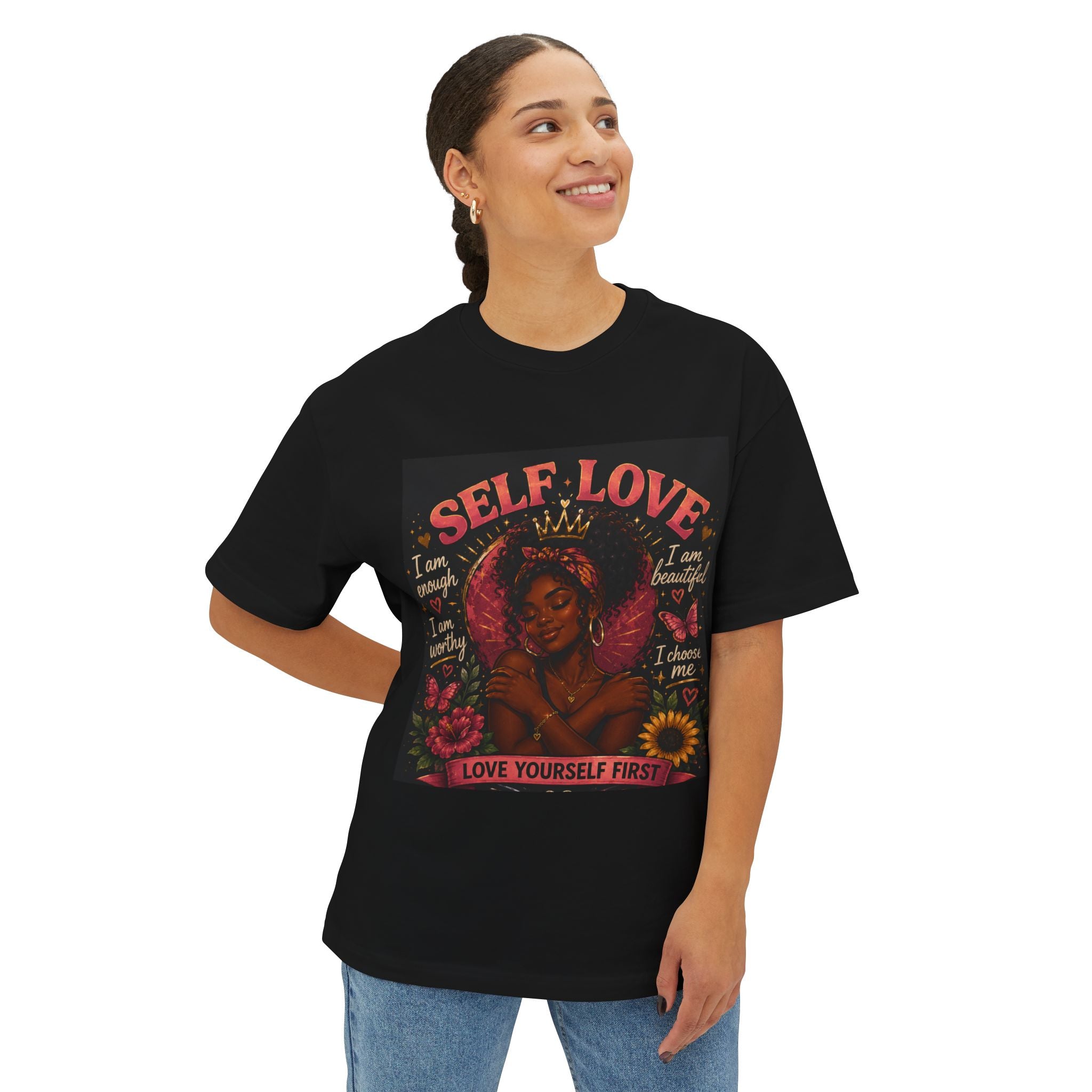 Black boxy T-shirt with "Love Yourself First" graphic print, casual self-love slogan, by Printify.