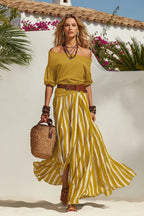 Women's casual off-shoulder top and slit maxi skirt set by Plush Fashion Hub, featuring a stylish, relaxed fit and elegant design.