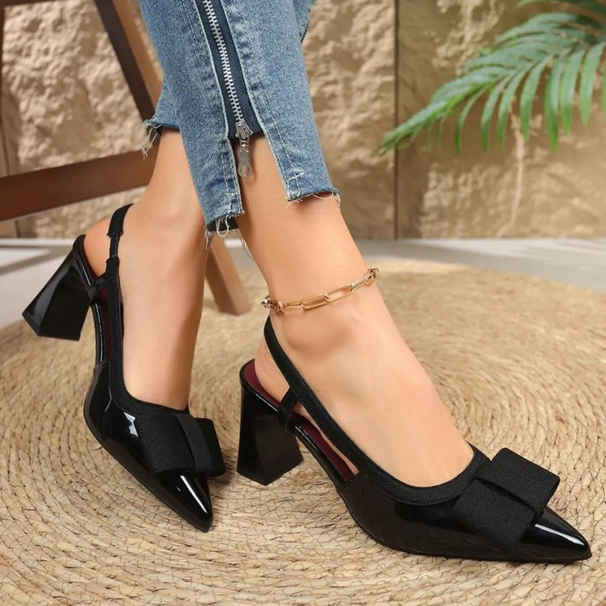 Point toe block heels slingback sandals in neutral tones, stylish footwear by Trendsi with open back and comfortable heel height.