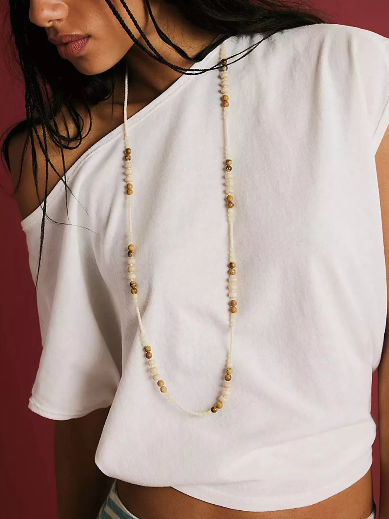 Solid color one-shoulder T-shirt from Plush Fashion Hub, stylish tops with a single shoulder design, casual and trendy for everyday wear.