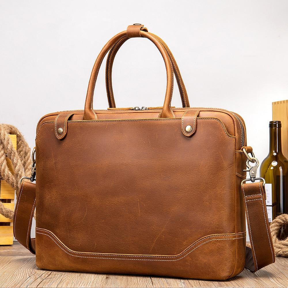 Plush Fashion Hub Crazy Horse leather men's briefcase with sturdy handle and sleek design for professional use.
