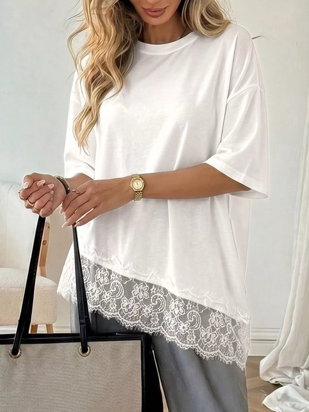 Lace detail half sleeve t-shirt by Plush Fashion Hub, soft fabric with elegant lace accents on the sleeves and neckline.