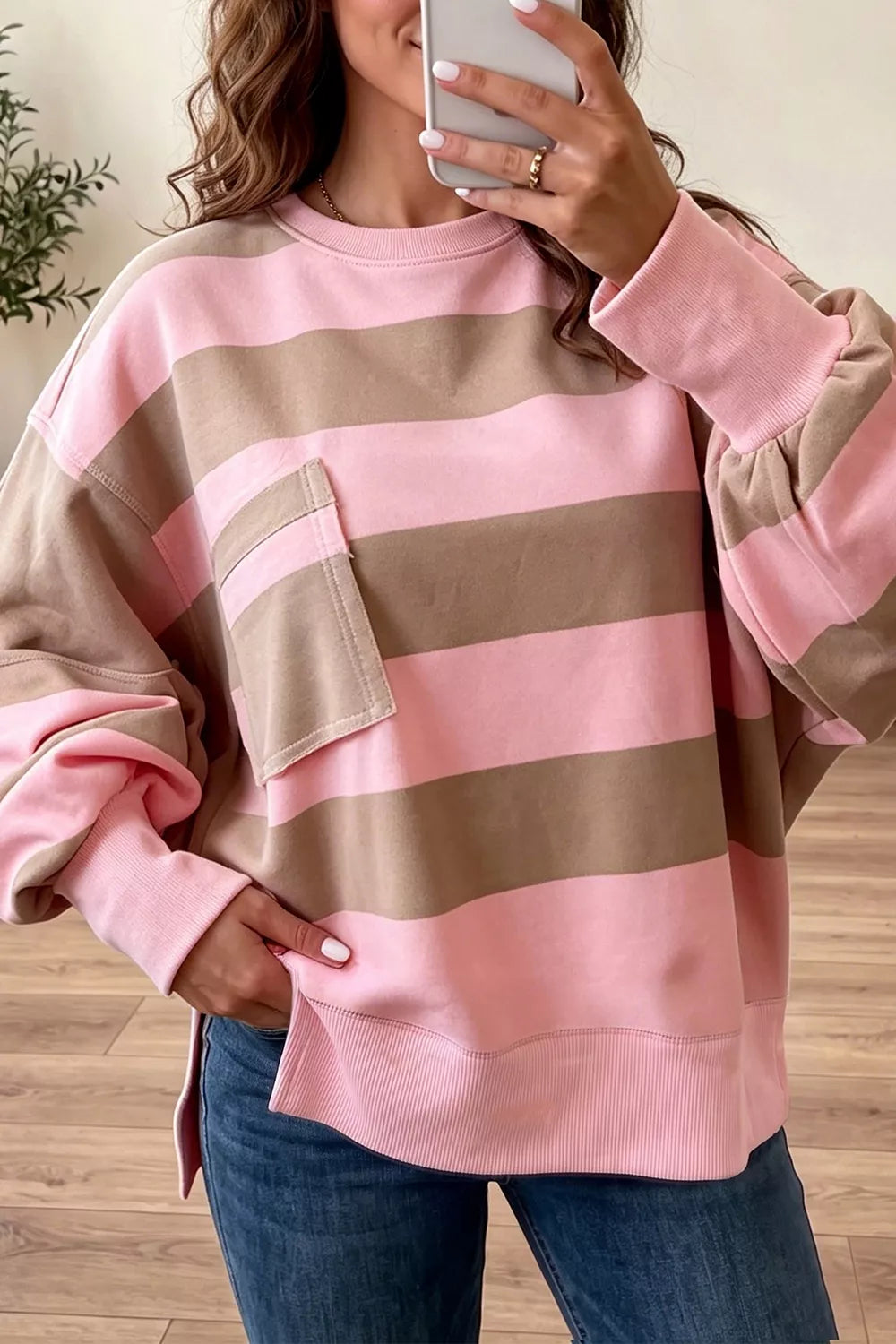 Oversized Trendsi colorblock striped long sleeve sweatshirt with patch pocket and split hem, casual and cozy style.