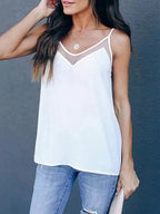 Plus size V-neck cami top from Trendsi, full size, soft fabric, sleeveless design, ideal for casual or layered looks.