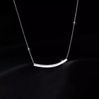 Sterling silver chain necklace by Shopimist showcasing a classic, polished silver link design on a plain background.