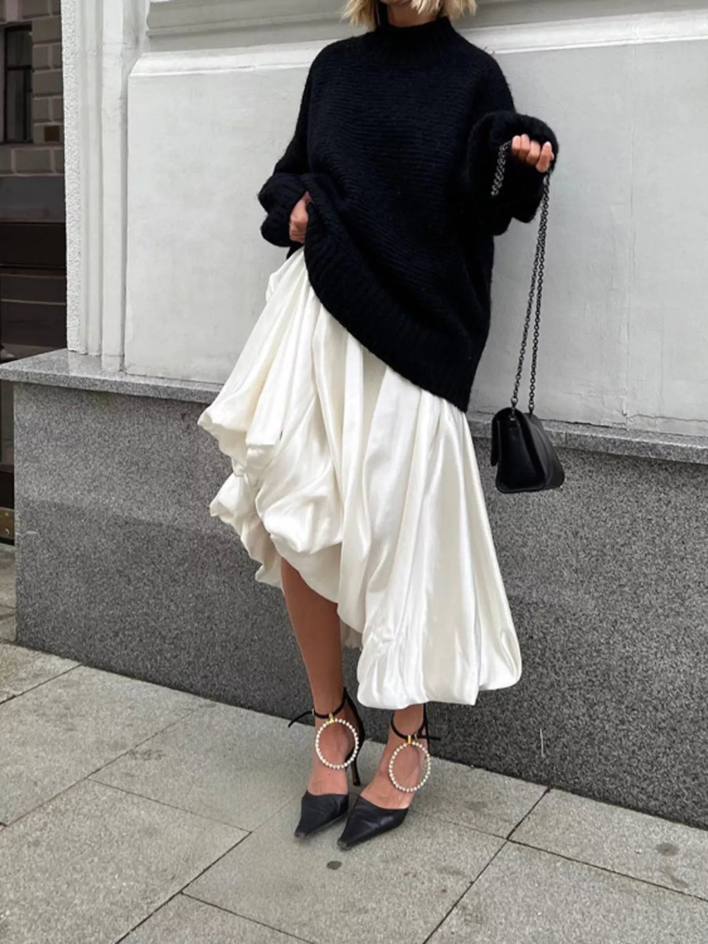 Flowy satin maxi skirt by Shopimist featuring a smooth, shiny fabric and flowing design, displayed on a neutral background.