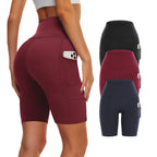 Three high-waisted biker yoga shorts from FitiqueFit in black, designed for activewear and flexible movement.