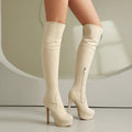Black suede over-the-knee high heel riding boots for women with elastic sides and pointed toes, by FitiqueFit.