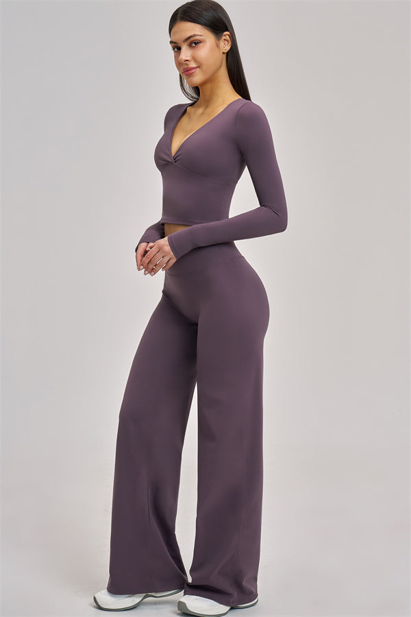 Fitglutes Activewear long sleeve crop top from The Swoon collection, featuring a fitted design and stylish neckline for workout wear.