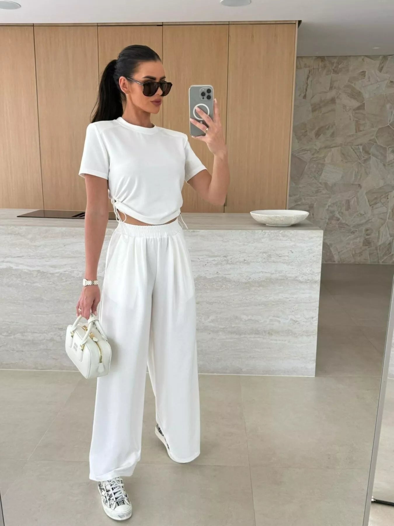 Drawstring crop top and wide-leg pants set from Plush Fashion Hub, stylish two-piece outfit perfect for casual wear.