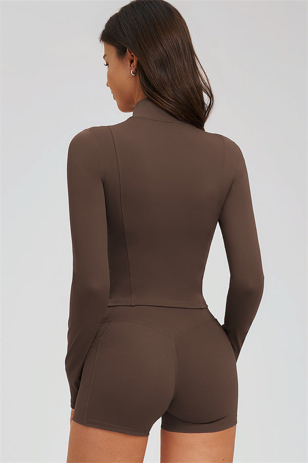 Fitglutes Activewear sports bra, zip jacket, and shorts 3-piece set for workout or gym, shown on a model.
