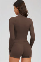 Fitglutes Activewear sports bra, zip jacket, and shorts 3-piece set for workout or gym, shown on a model.