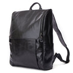 Black leather computer backpack from Plush Fashion Hub, featuring a sleek first layer leather design with multiple compartments.