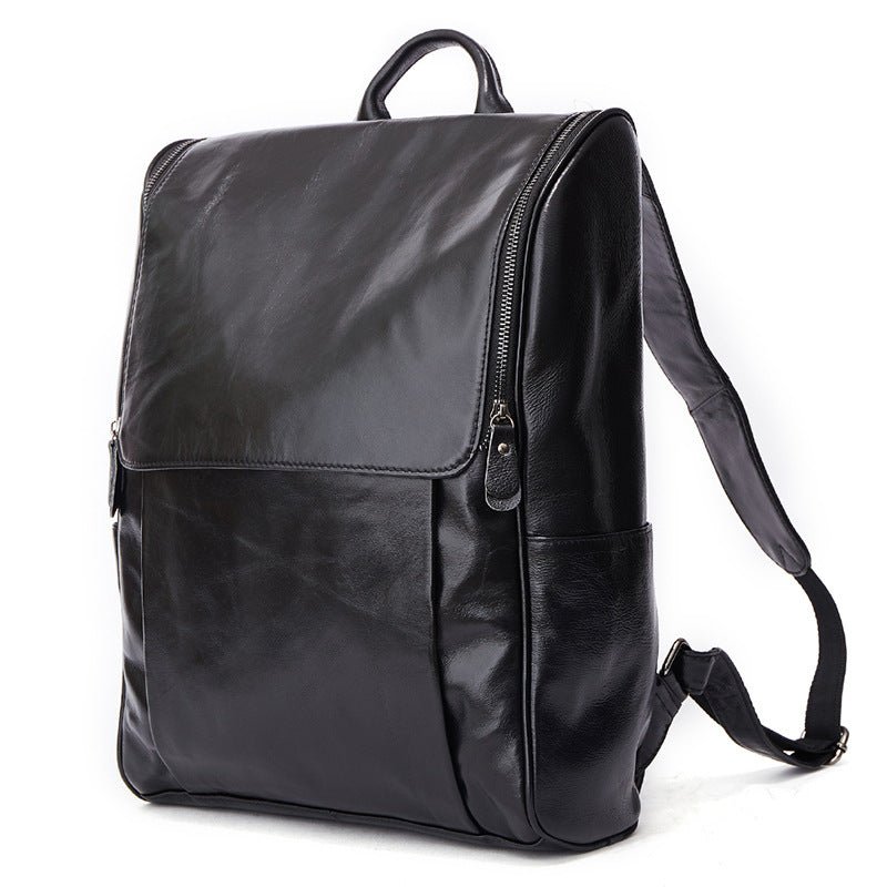 Black leather computer backpack from Plush Fashion Hub, featuring a sleek first layer leather design with multiple compartments.