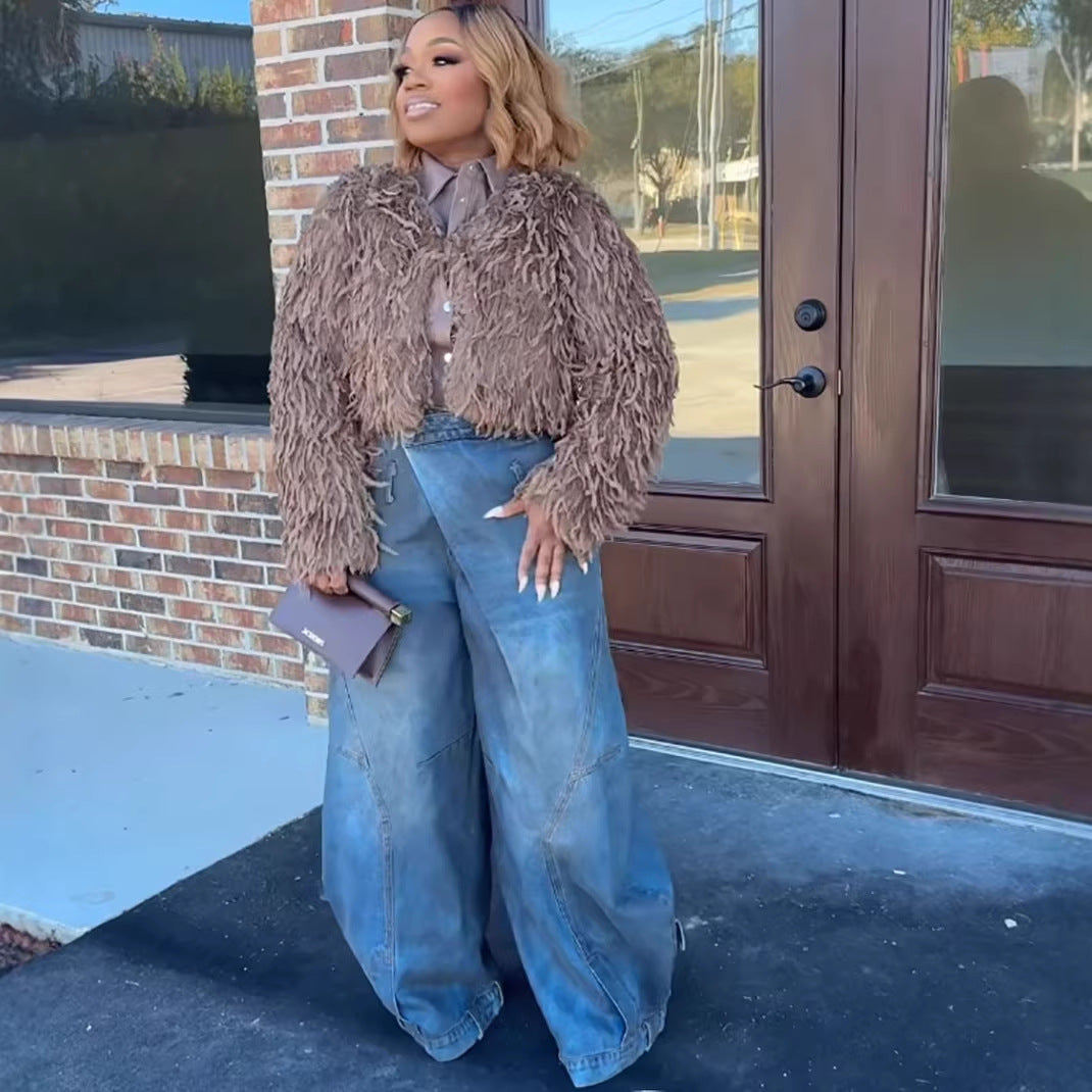 Women's vintage distressed washed wide-leg denim jeans by Plush Fashion Hub, featuring a relaxed fit and faded, worn-in look.