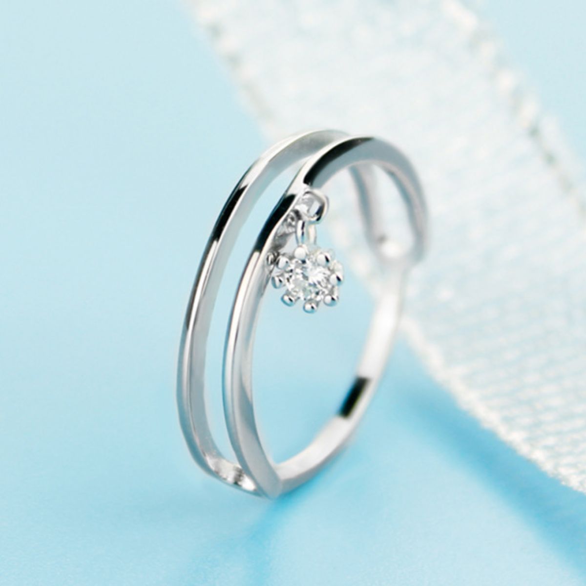 Double layered 925 sterling silver ring with intricate design, showcasing a stylish and elegant jewelry piece from Plush Fashion Hub.
