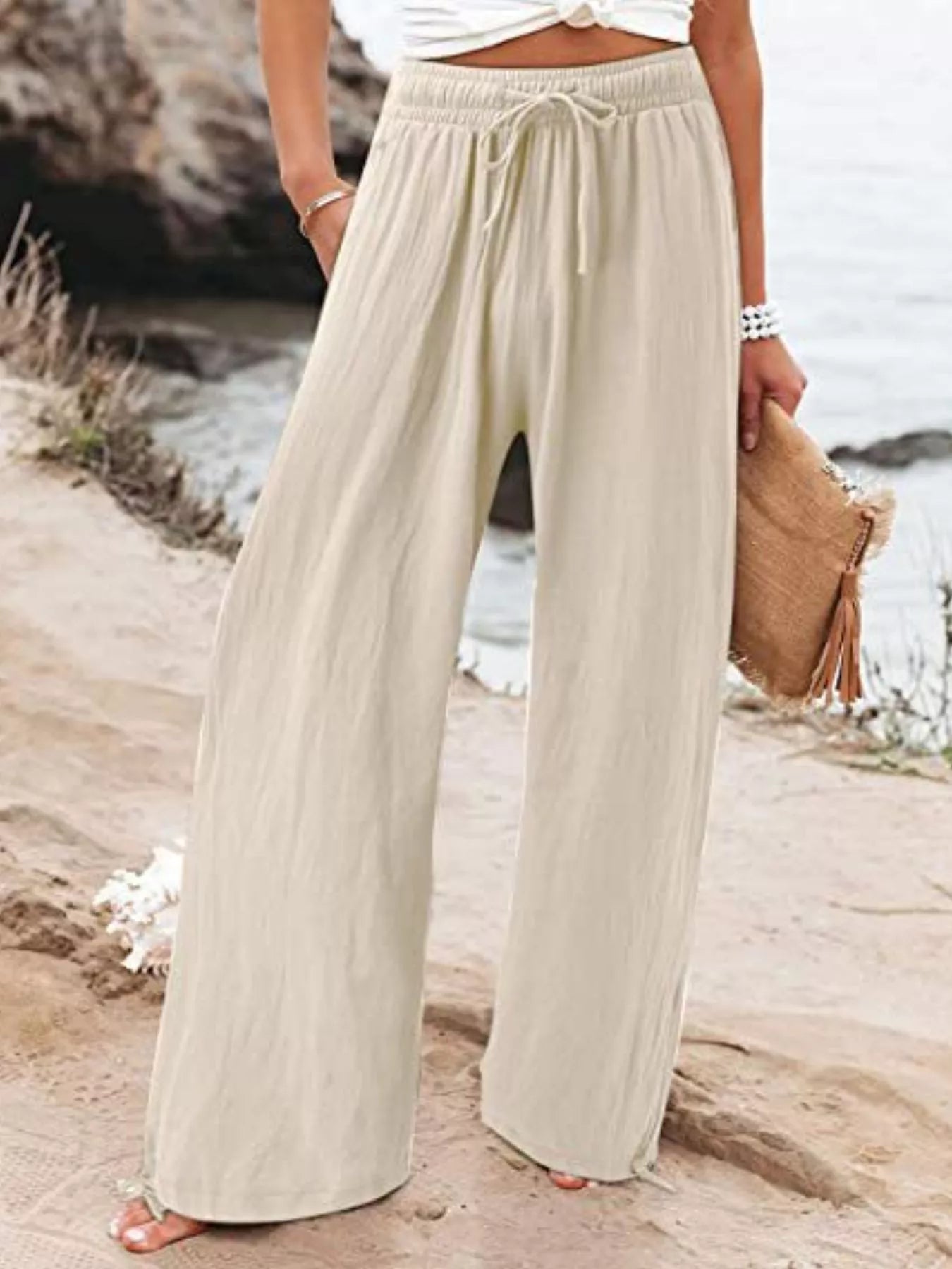 Plus size full size wide leg pants with drawstring waist from Plush Fashion Hub, featuring a relaxed fit and comfortable fabric.