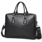 Men's leather briefcase from Plush Fashion Hub, large capacity cowhide handbag with horizontal design and sturdy handles.