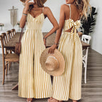 Bright ginger yellow printed backless sleeveless jumpsuit from FitiqueFit, featuring a strap design and stylish, casual fit.