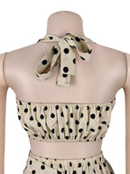Polka dot halter neck cami with fringe trim pants set featuring rings detail, stylish trendy fashion by Trendsi.